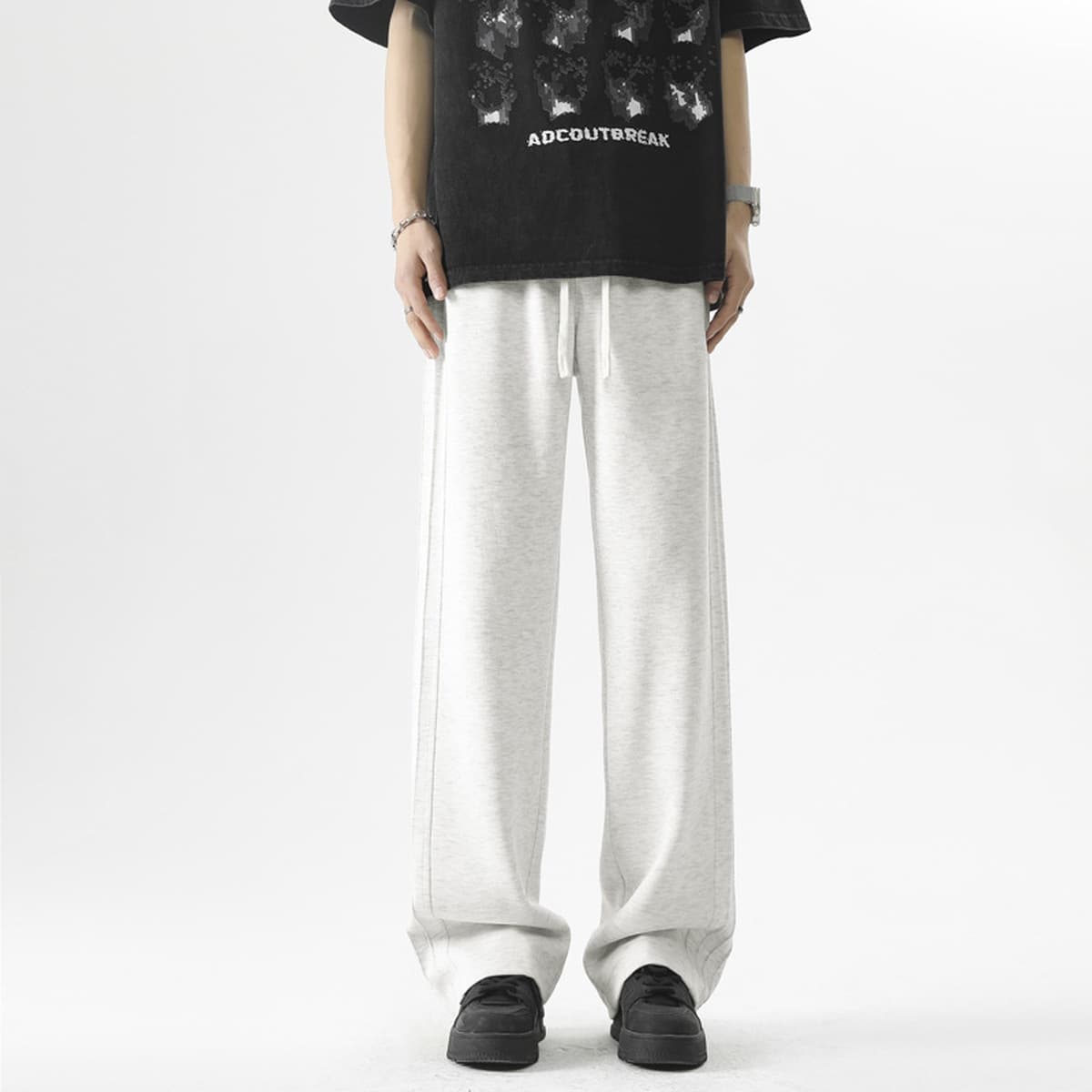 Повседневные брюки мужские 2024 летние свободные дикие сплошные спортивные брюки мужские прямые шнуровки мужские беговые...