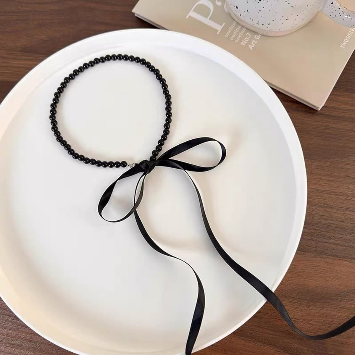 Южная Корея Донгдэмун тот же черный бант с жемчужным ожерельем ins чистый ветер продвинутый ключица